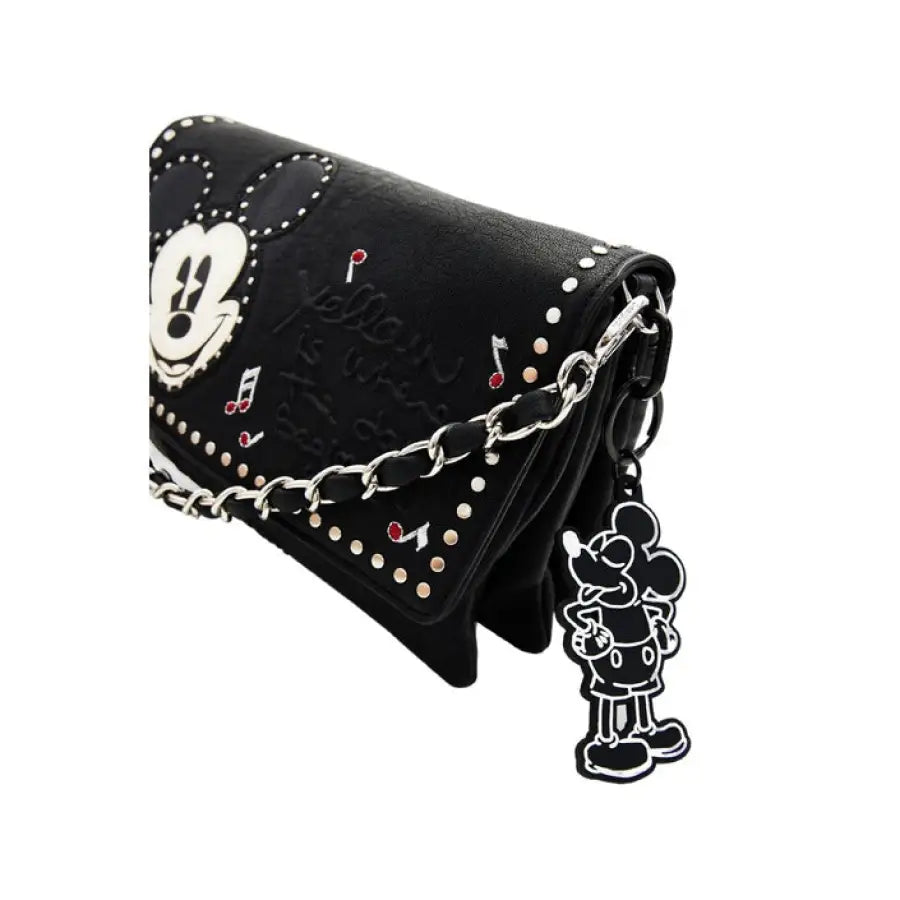 
                      
                        Desigual women bag featuring a black purse with a skull and crossbones design
                      
                    
