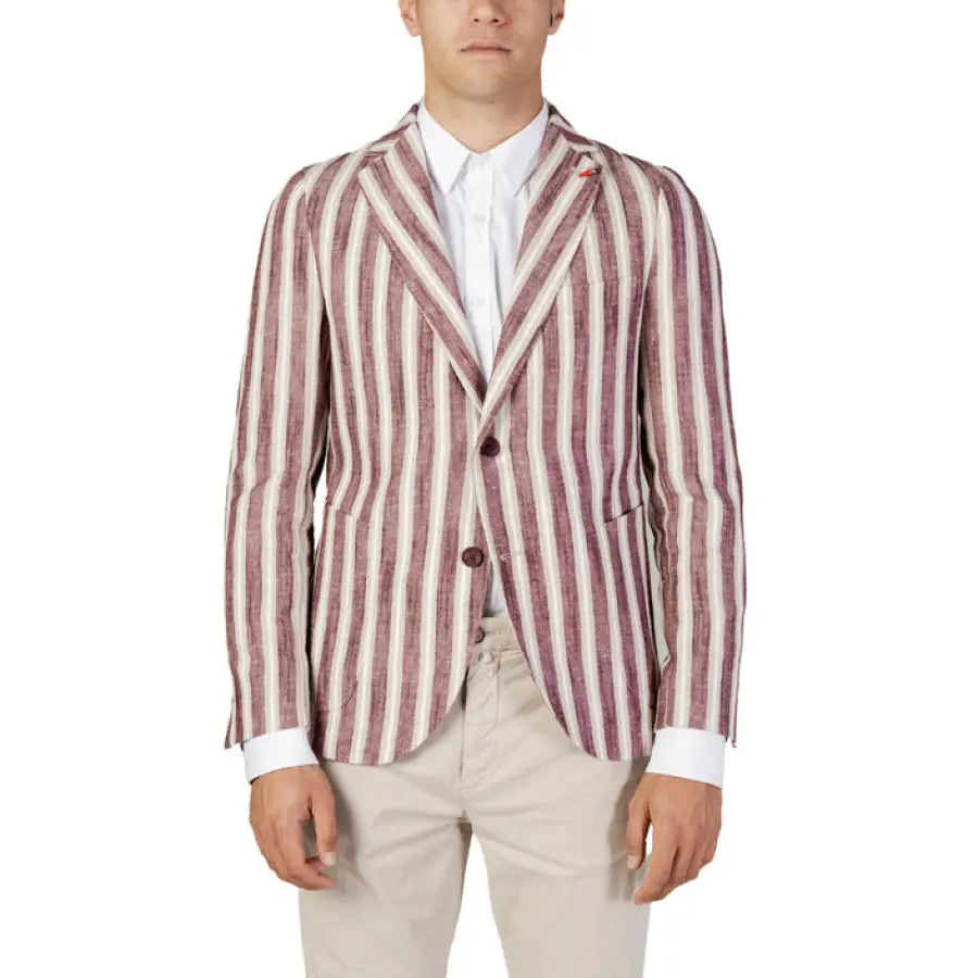 
                      
                        Man in Mulish Men Blazer, striped jacket and white shirt on display.
                      
                    