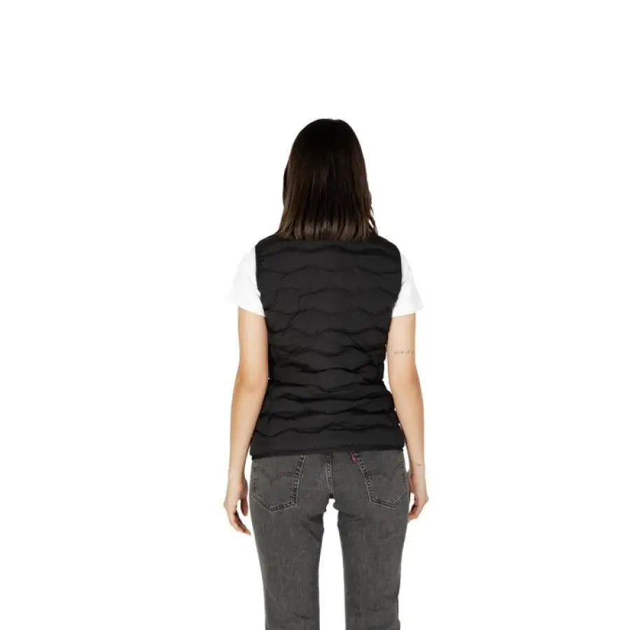 Woman in urban style wearing black Ea7 Women Gilet vest