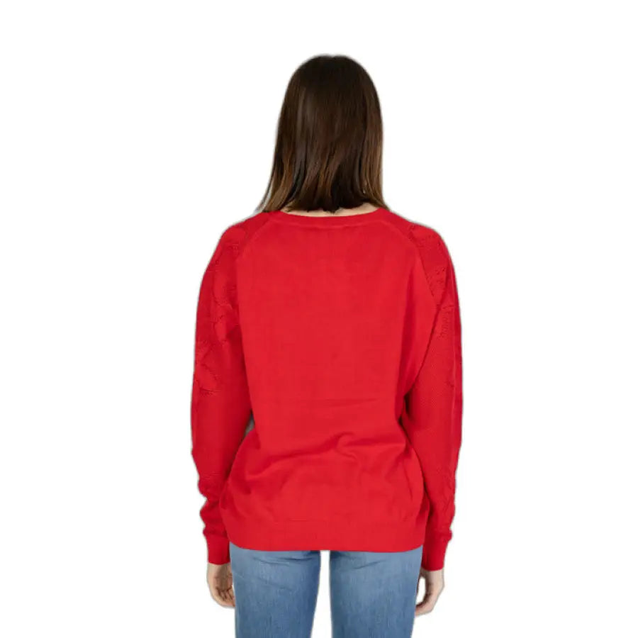 
                      
                        Desigual women knitwear featuring woman in red sweater and jeans
                      
                    