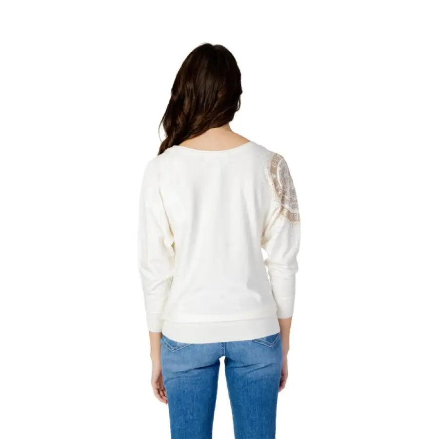 
                      
                        Guess guess women knitwear model in white sweater with lace sleeves
                      
                    